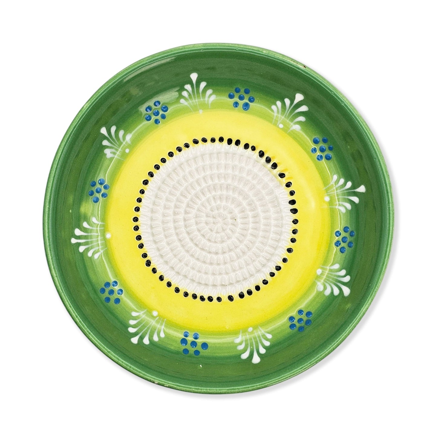 Decorative garlic grater bowl with green rim, yellow center, and white and blue floral patterns on a white background
