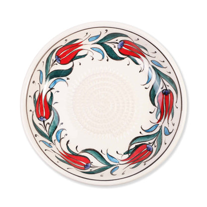 Decorative garlic grater bowl with floral design on a white background