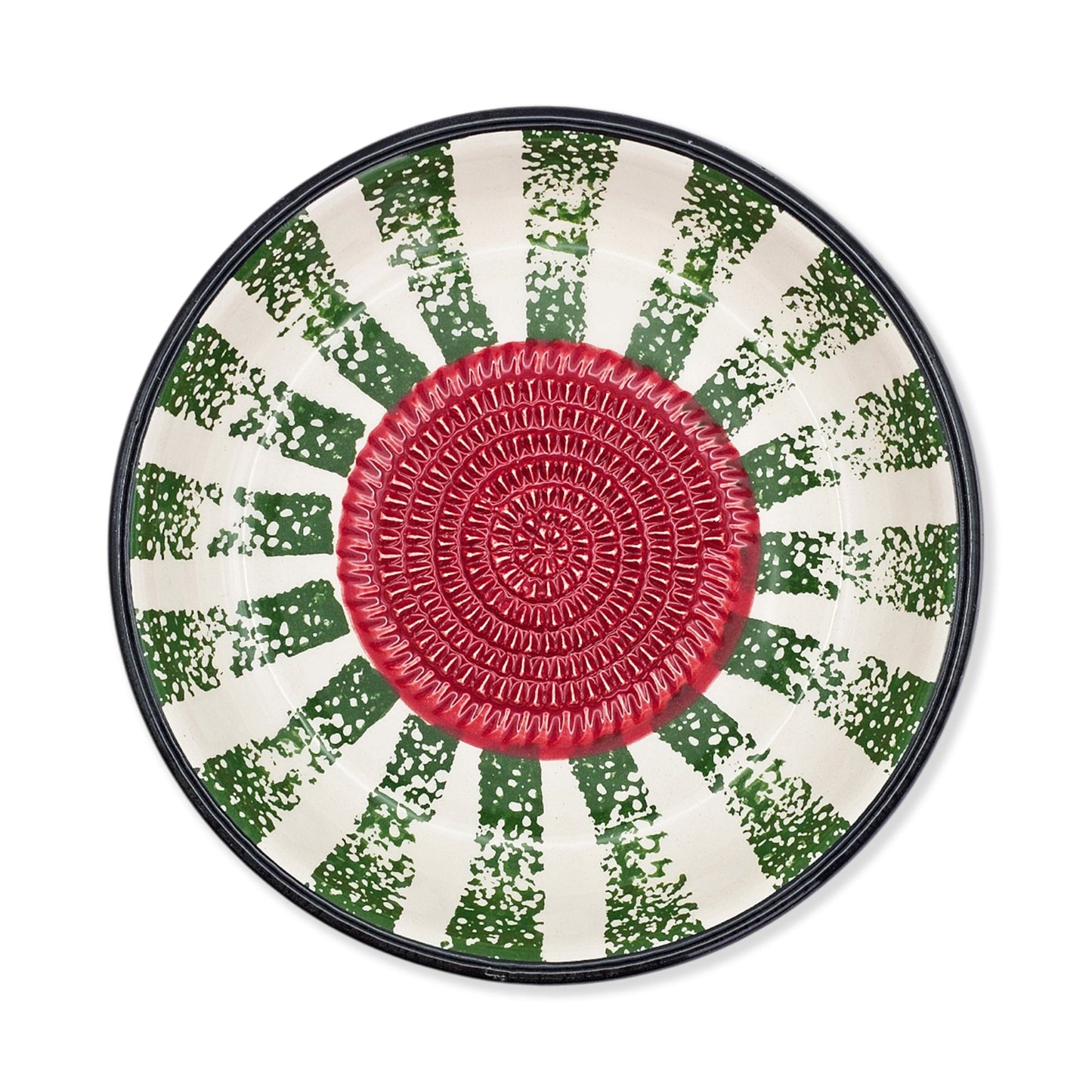 Round garlic grater bowl with a red center and green and white patterned rim on a white background