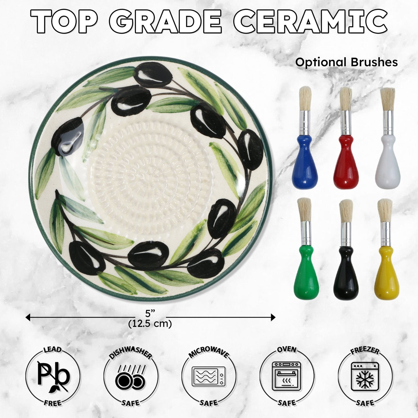 Ceramic garlic grater plate with olive design and optional brushes on a marble background