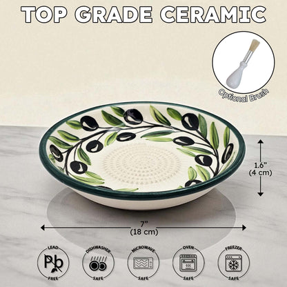 Ceramic garlic grater bowl with olive design and measurements on a neutral background