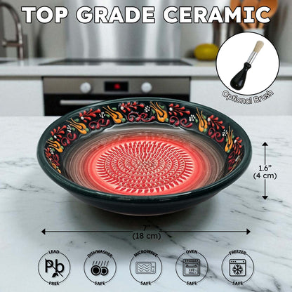 Decorative ceramic garlic grater bowl with floral patterns on a marble surface, showing dimensions and safety icons.