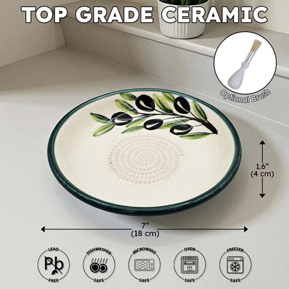 Top grade ceramic garlic grater bowl with olive design on a white surface, featuring dimensions and safety icons.