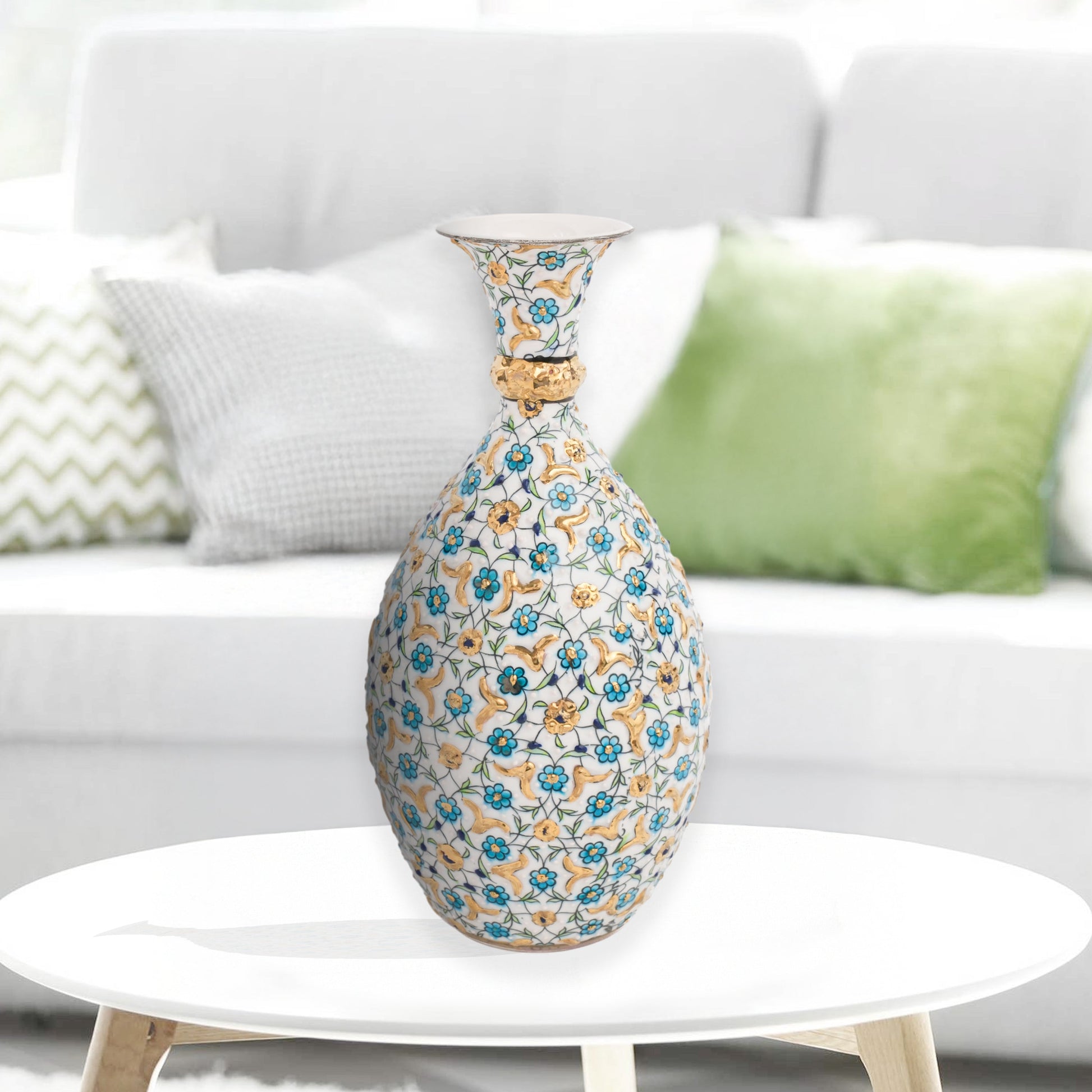 Hand-painted ceramic decorative bottle with turquoise and gold floral motifs on ivory. Glossy artisan vase, elegant décor accent, perfect for gifting.