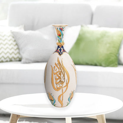 Hand-painted ceramic decorative bottle with golden Arabic calligraphy on ivory, accented with floral motifs. Glossy artisan vase, perfect for décor or gifts.