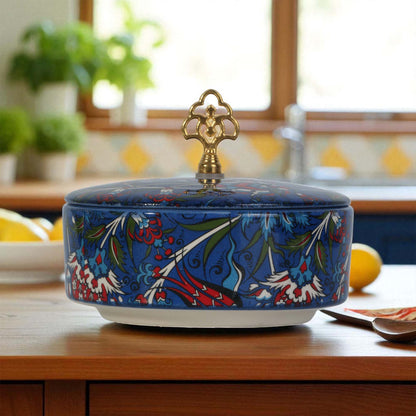 Decorative ceramic sugar bowl with floral patterns on a kitchen counter