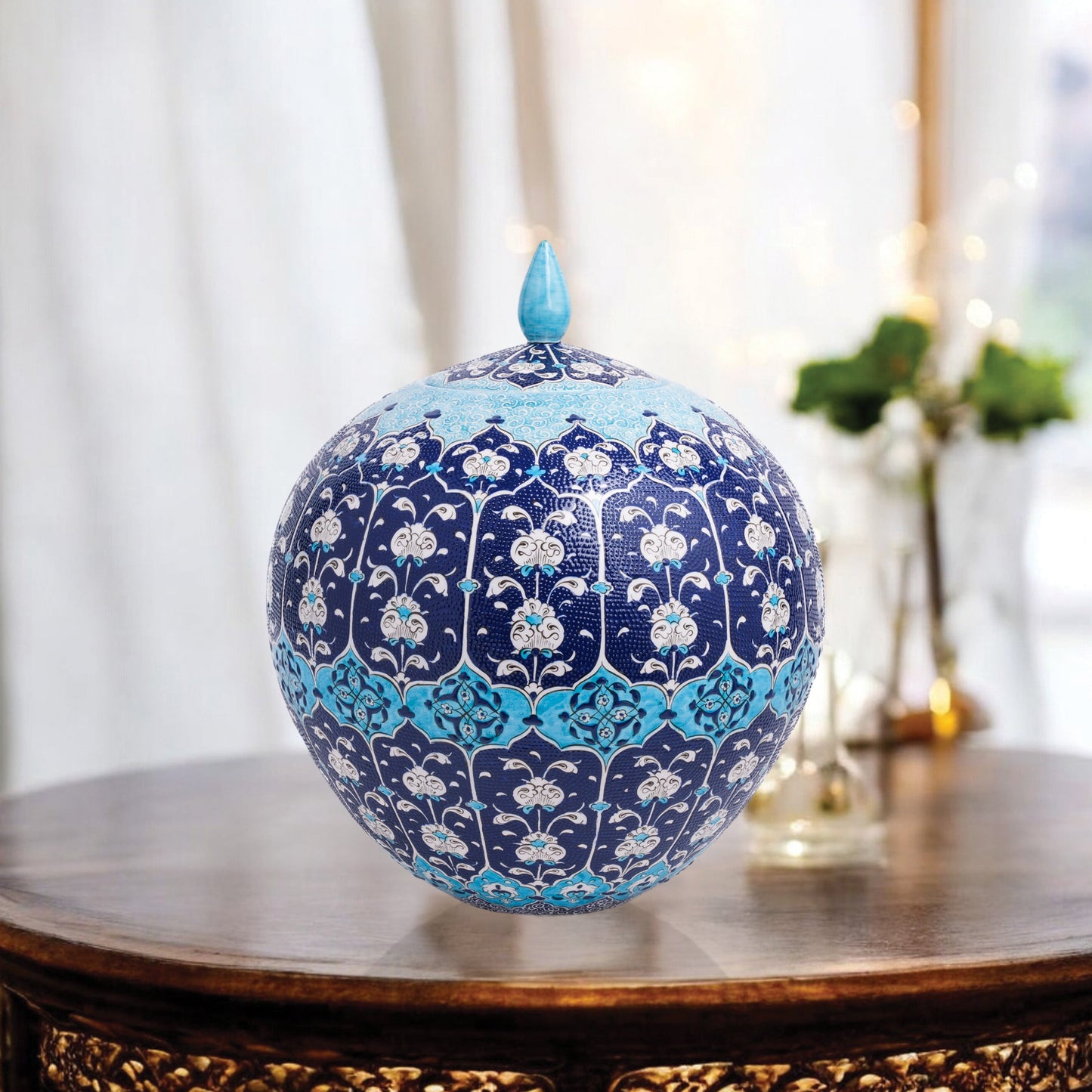 Hand-painted Ottoman Blue globe jar with white floral motifs on navy and turquoise. Round lidded ceramic jar, artisan-made, perfect décor or gift.