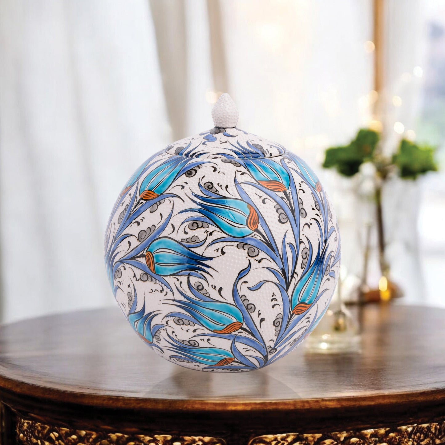 Hand-painted Turquoise Tulip globe jar with Ottoman floral motifs in turquoise & cobalt. Spherical ceramic design, artisan-made, perfect décor or gift.