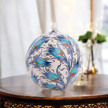 Hand-painted Turquoise Tulip globe jar with Ottoman floral motifs in turquoise & cobalt. Spherical ceramic design, artisan-made, perfect décor or gift.
