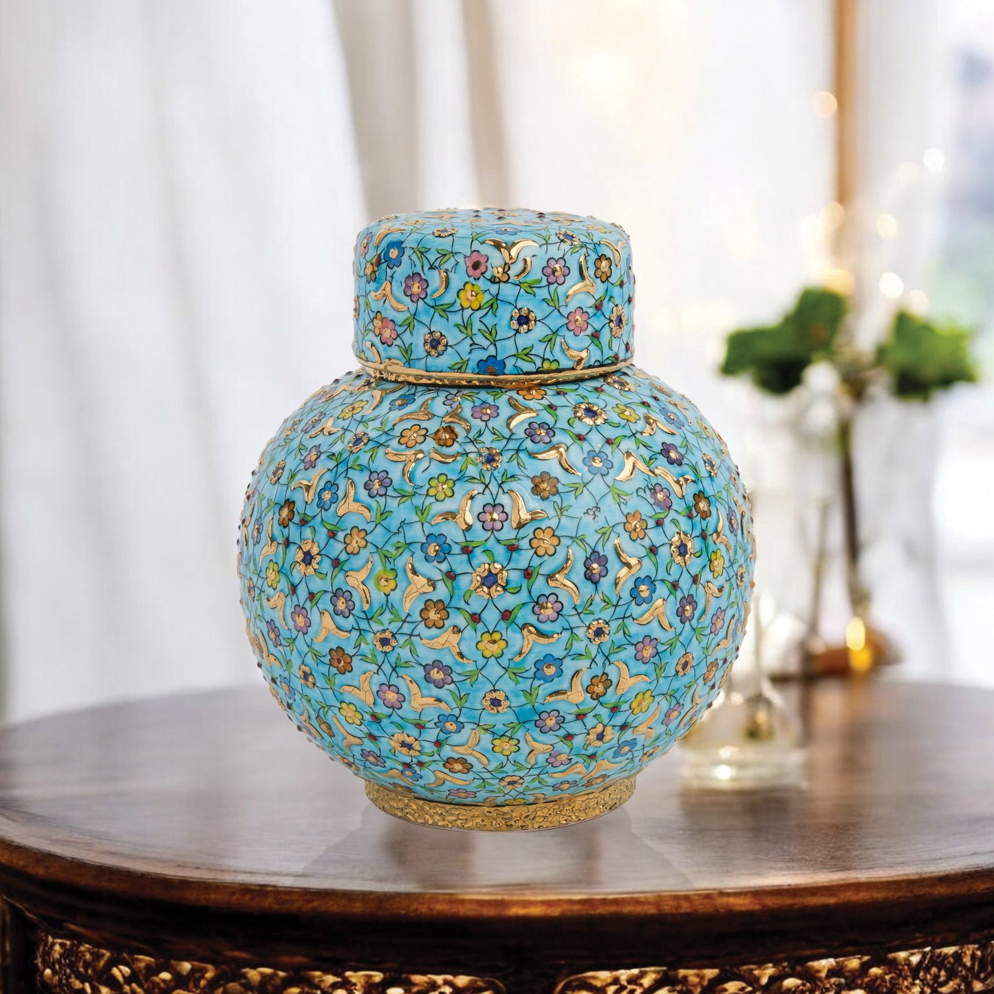 Hand-painted Turquoise Blossom ceramic jar with lid. Features floral motifs in turquoise, lavender & gold. Round melon shape, artisan-made, perfect décor.