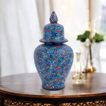 Hand-painted Blossom Night ceramic jar with vivid yellow, red & blue florals on cobalt base. Glossy artisan jar with ornate finial, perfect décor or gift.