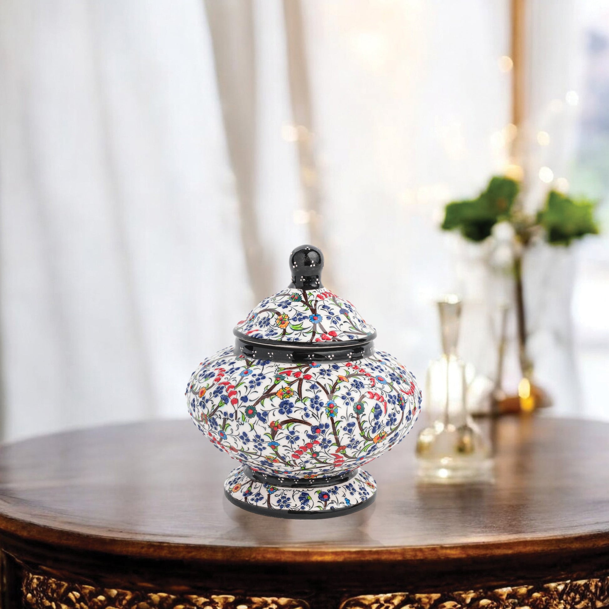 Hand-painted Floral Meadow ceramic jar with multicolor wildflowers on white, black rim & finial. Lidded artisan jar, perfect as honey pot, candy bowl, or gift.