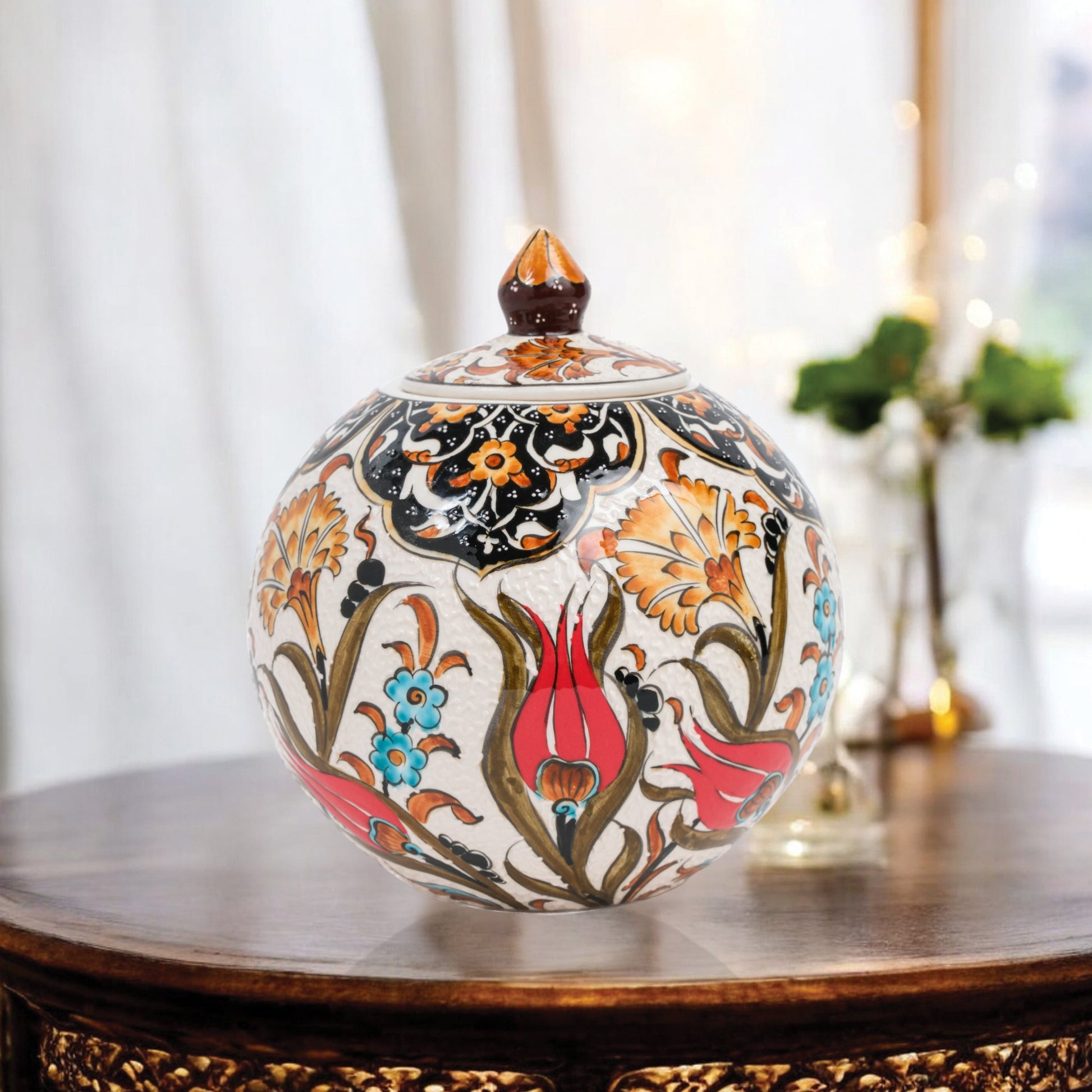 Hand-painted Red Tulip globe jar with Ottoman floral motifs in red, blue & gold. Glossy round ceramic jar, artisan-crafted, perfect décor or thoughtful gift.