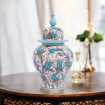 Hand-painted Blue Tulip ceramic jar with Ottoman floral motifs in blue and orange. Finished with turquoise lid, artisan-made, perfect décor or collector’s gift.
