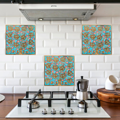Decorative turquoise and gold ceramic tiles above a stove in a kitchen.