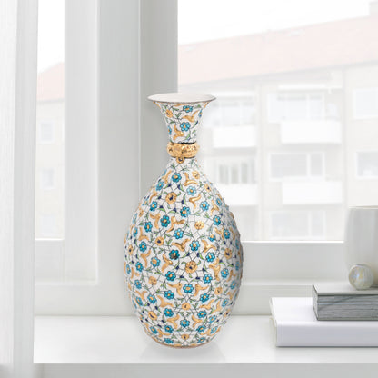 Hand-painted ceramic decorative bottle with turquoise and gold floral motifs on ivory. Glossy artisan vase, elegant décor accent, perfect for gifting.