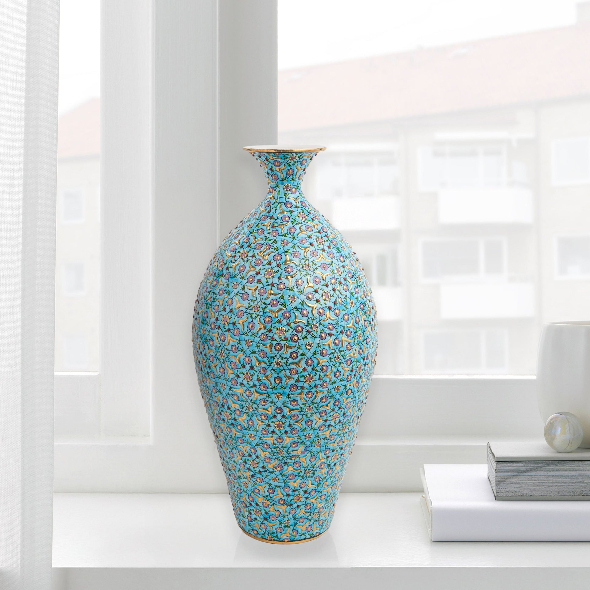 Hand-painted ceramic decorative bottle with floral motifs on turquoise base. Ottoman-inspired artisan vase, glossy glazed, perfect for décor or gifting.