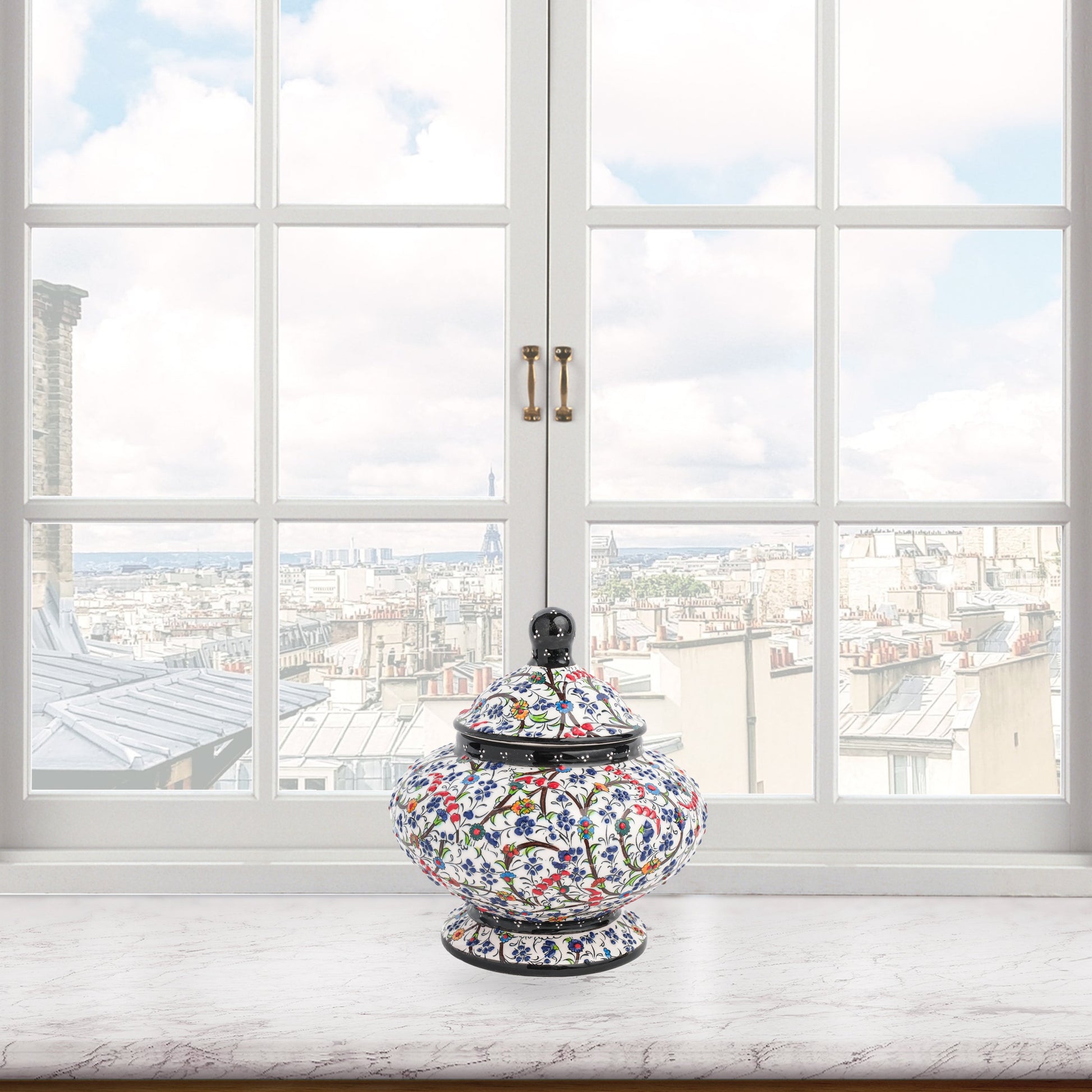 Hand-painted Floral Meadow ceramic jar with multicolor wildflowers on white, black rim & finial. Lidded artisan jar, perfect as honey pot, candy bowl, or gift.