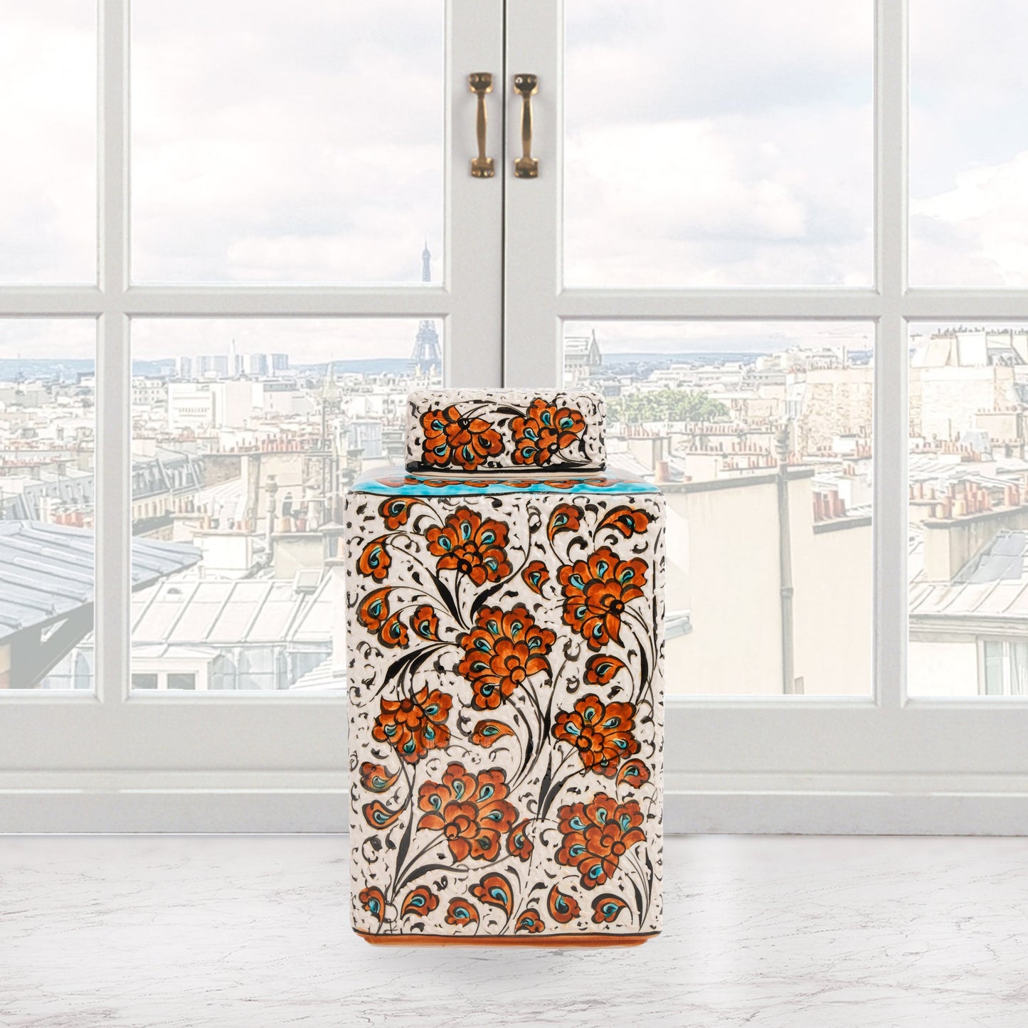 Hand-painted Terracotta Bloom ceramic jar with vivid orange floral motifs. Square lidded design, artisan-crafted, perfect for tea, spices, décor, or gifts.
