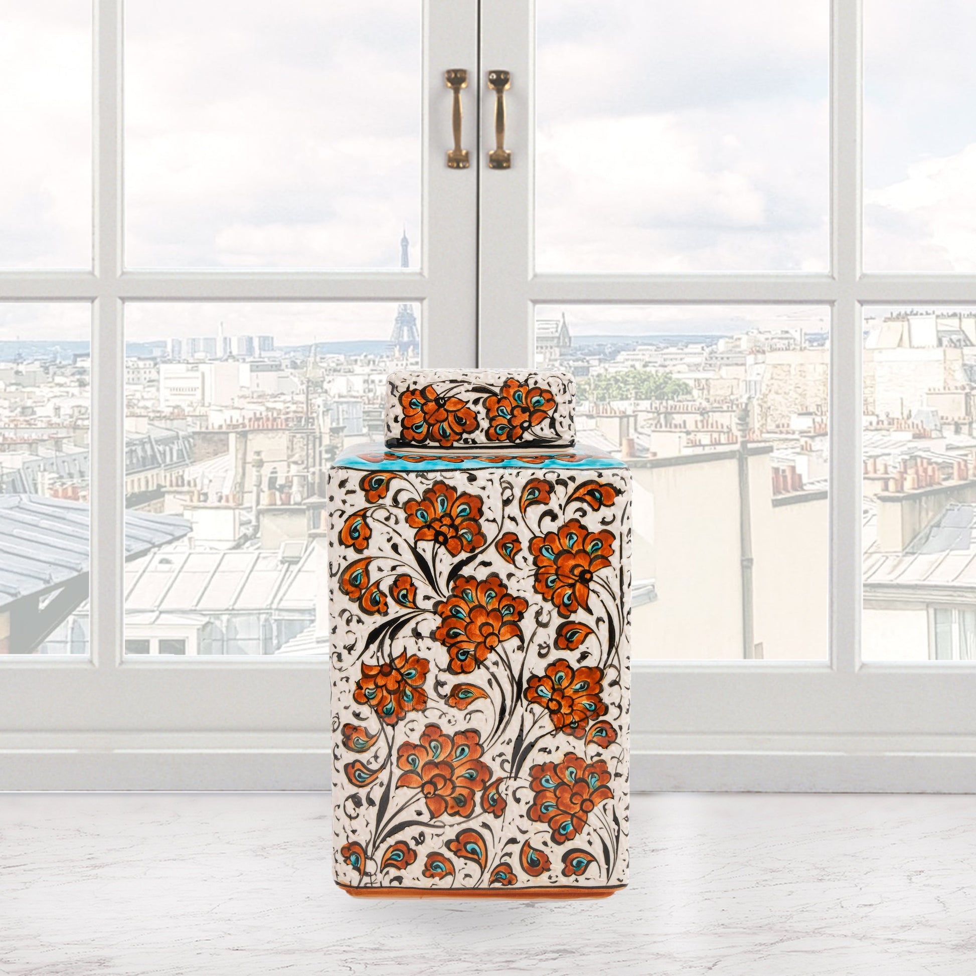 Hand-painted Terracotta Bloom ceramic jar with vivid orange floral motifs. Square lidded design, artisan-crafted, perfect for tea, spices, décor, or gifts.