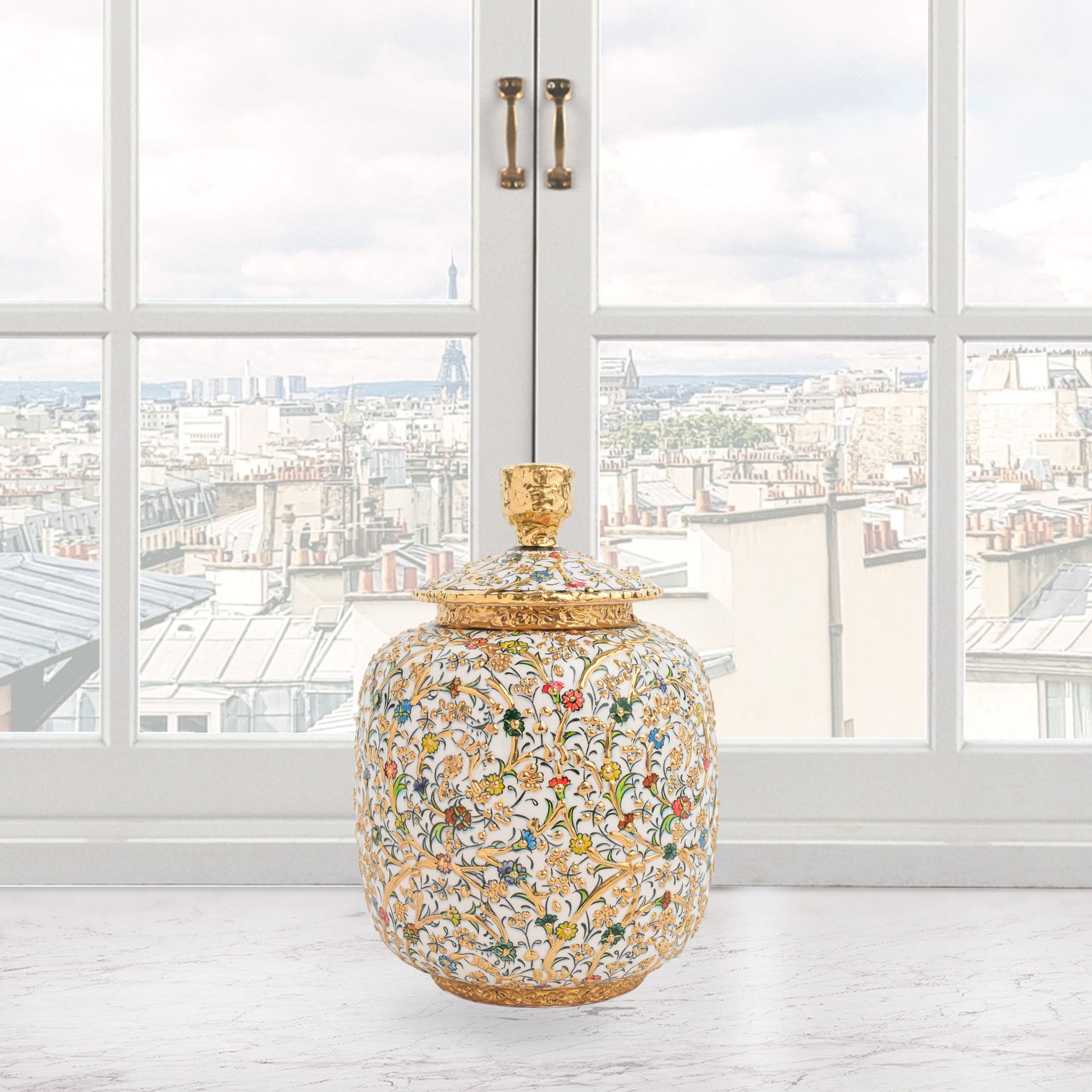 Hand-painted Golden Blossom ceramic jar with colorful floral motifs and gold accents. Lidded artisan jar, ideal for honey, ginger, spices, or elegant décor.