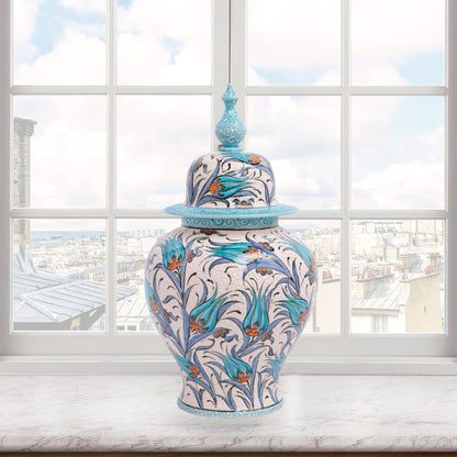 Hand-painted Blue Tulip ceramic jar with Ottoman floral motifs in blue and orange. Finished with turquoise lid, artisan-made, perfect décor or collector’s gift.