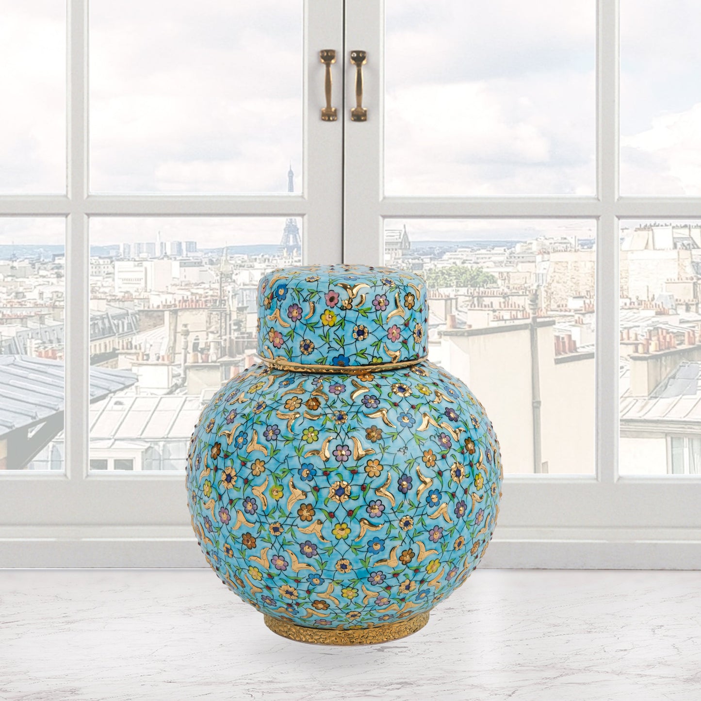 Hand-painted Turquoise Blossom ceramic jar with lid. Features floral motifs in turquoise, lavender & gold. Round melon shape, artisan-made, perfect décor.