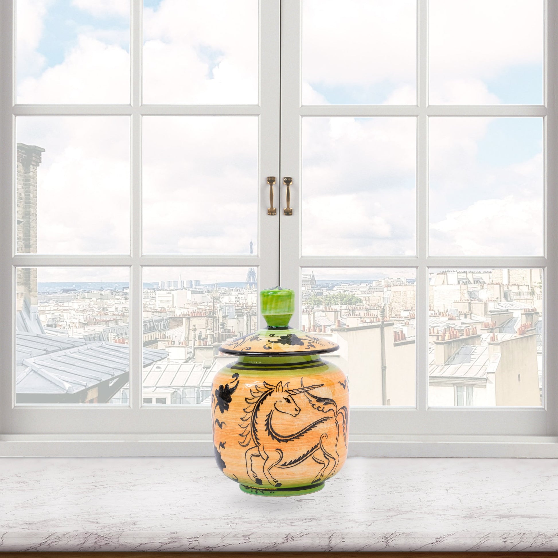Hand-painted Unicorn Dance ceramic jar with whimsical black unicorn motif on orange & green. Lidded artisan jar, perfect for honey, ginger, spices, or décor.