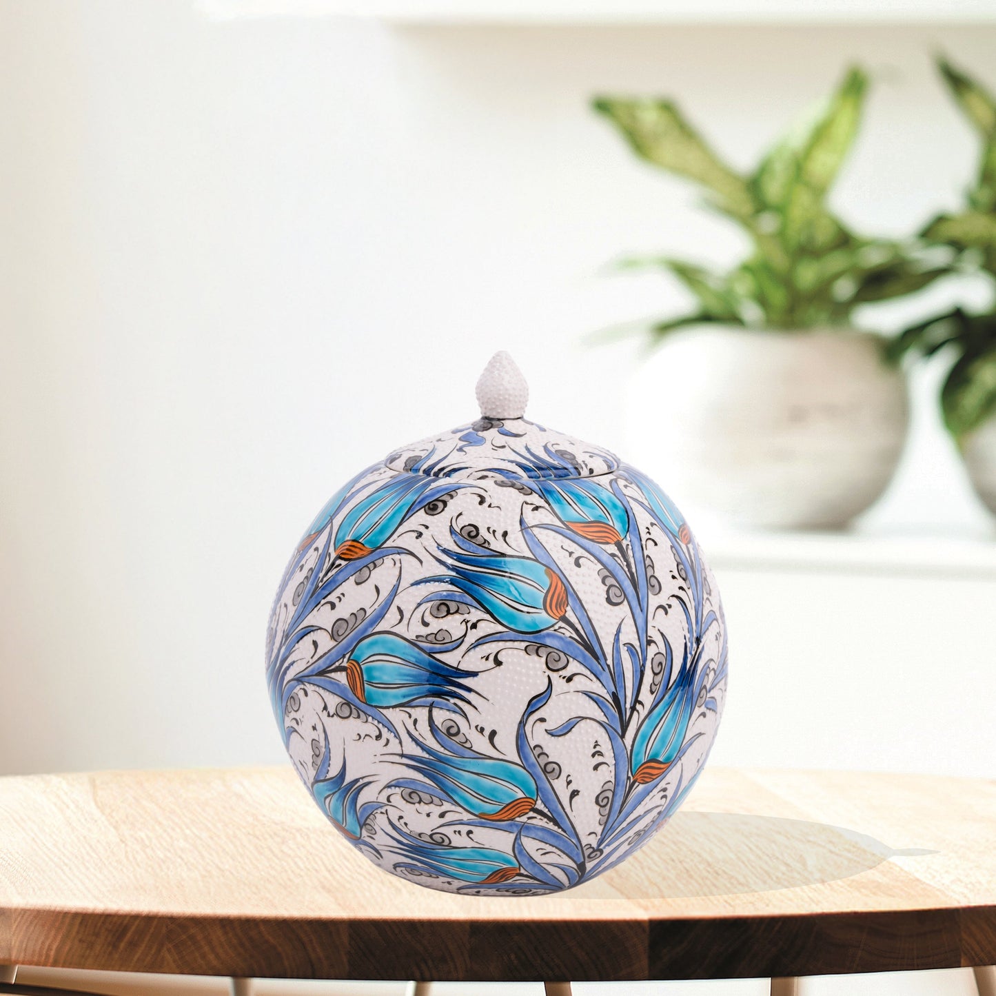 Hand-painted Turquoise Tulip globe jar with Ottoman floral motifs in turquoise & cobalt. Spherical ceramic design, artisan-made, perfect décor or gift.