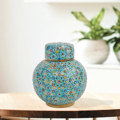 Hand-painted Turquoise Blossom ceramic jar with lid. Features floral motifs in turquoise, lavender & gold. Round melon shape, artisan-made, perfect décor.