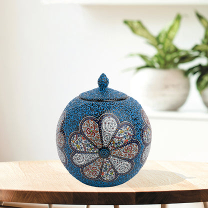 Hand-painted Blue Blossom globe jar with layered floral motifs and raised blue scrollwork. Spherical ceramic jar, artisan-made, perfect décor or gift.