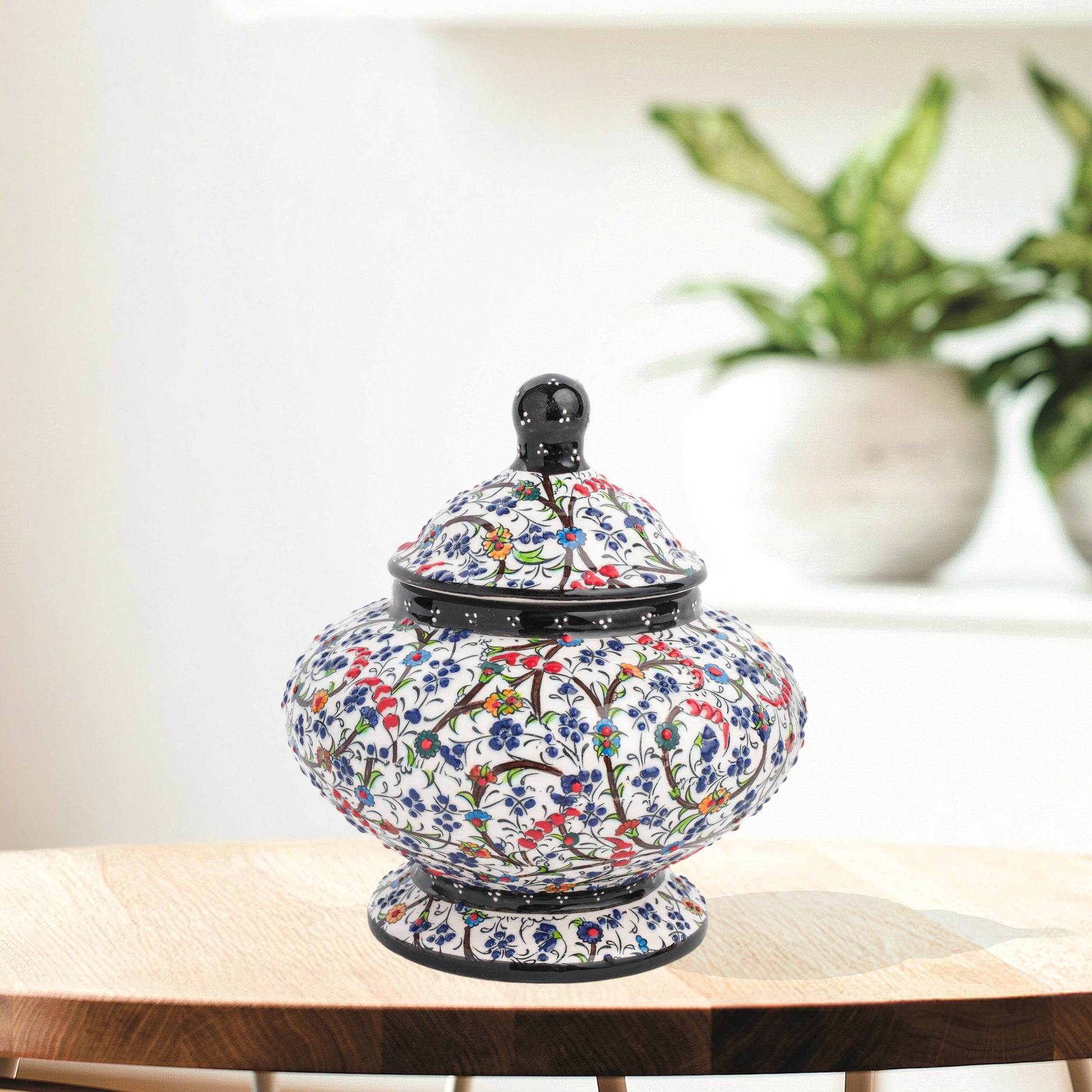 Hand-painted Floral Meadow ceramic jar with multicolor wildflowers on white, black rim & finial. Lidded artisan jar, perfect as honey pot, candy bowl, or gift.