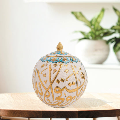 Hand-painted Gold Script globe jar with Arabic calligraphy in gold and turquoise floral trim. Spherical ceramic jar with gilded finial, perfect décor or gift.