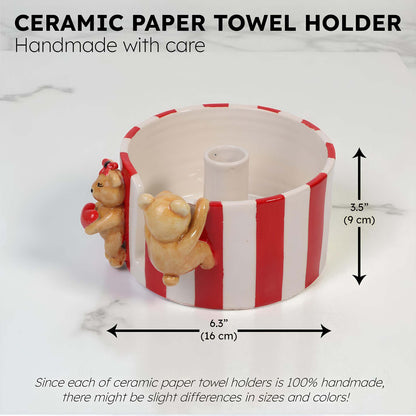 Ceramic paper towel holder with teddy bears on a white background