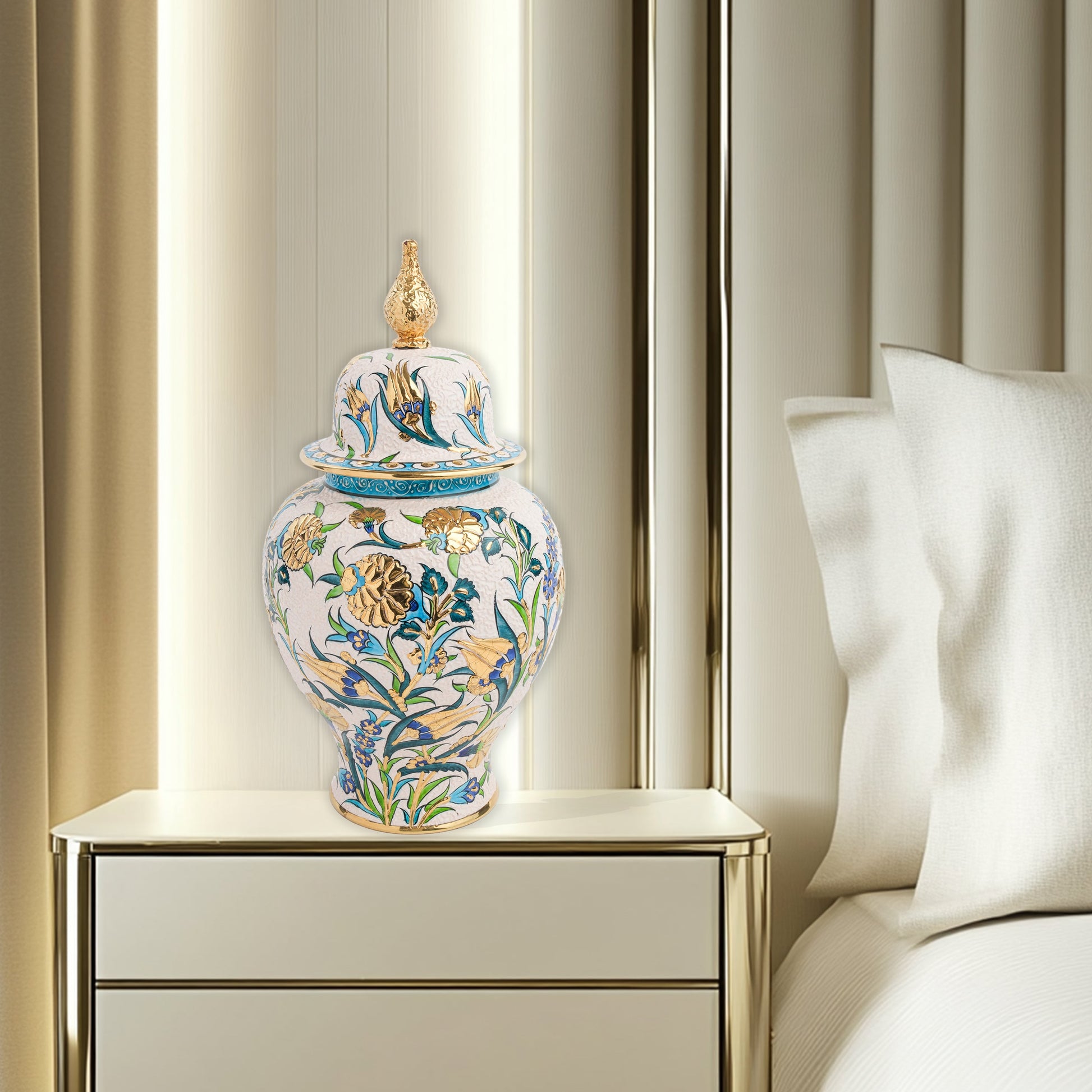 Hand-painted Golden Bloom ceramic jar with blue tulips, green leaves & gold accents. Finished with sculpted golden finial, artisan-made, perfect décor or gift.