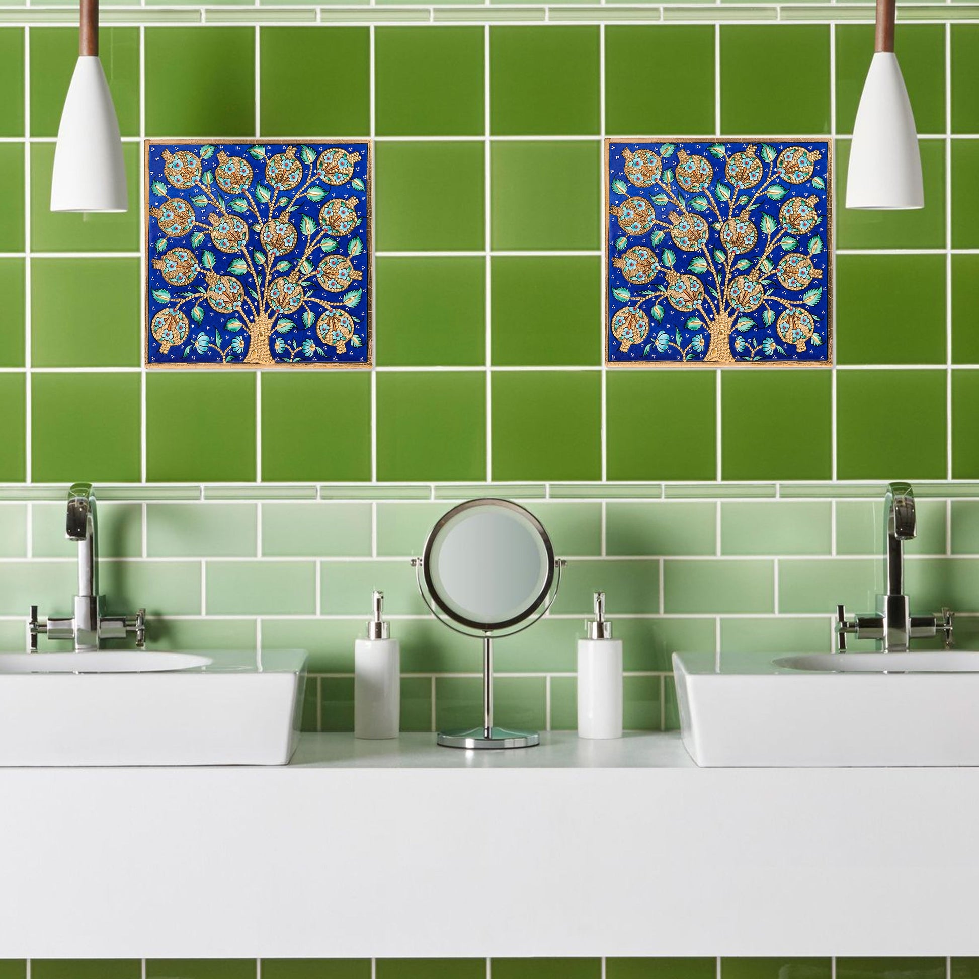 Bathroom with green tiles and decorative ceramic tiles above a sink.