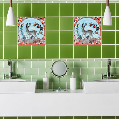 Bathroom with green tiled wall and decorative ceramic tiles above a sink.