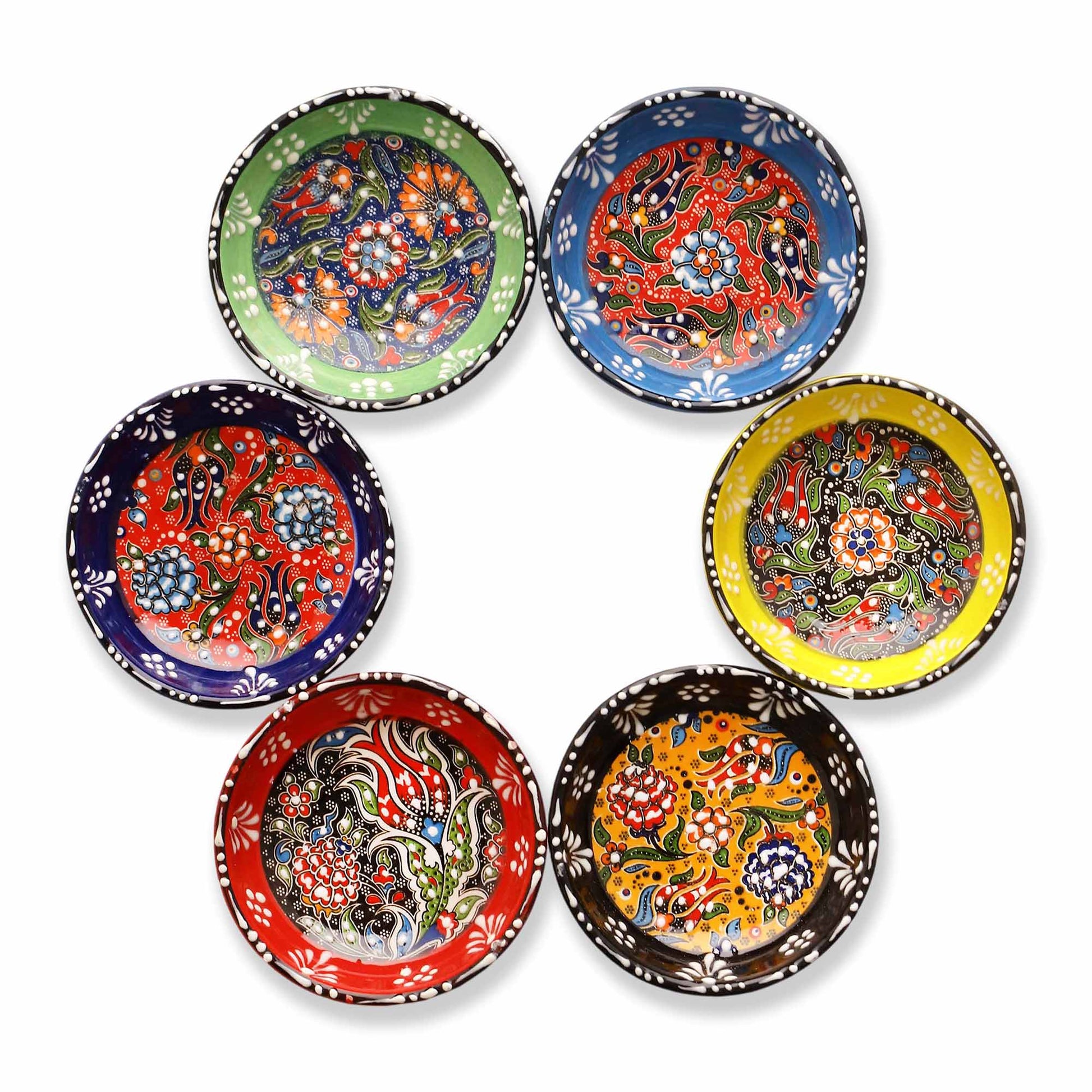 Set of six colorful ceramic dip bowls with intricate designs on a white background