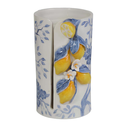 Ceramic paper towel holder with lemon and floral design on a white background