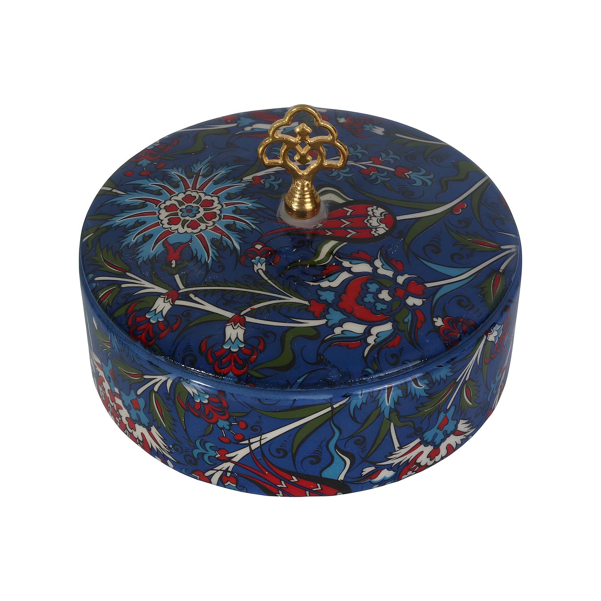 Decorative sugar bowl with floral patterns and a gold lid on a white background