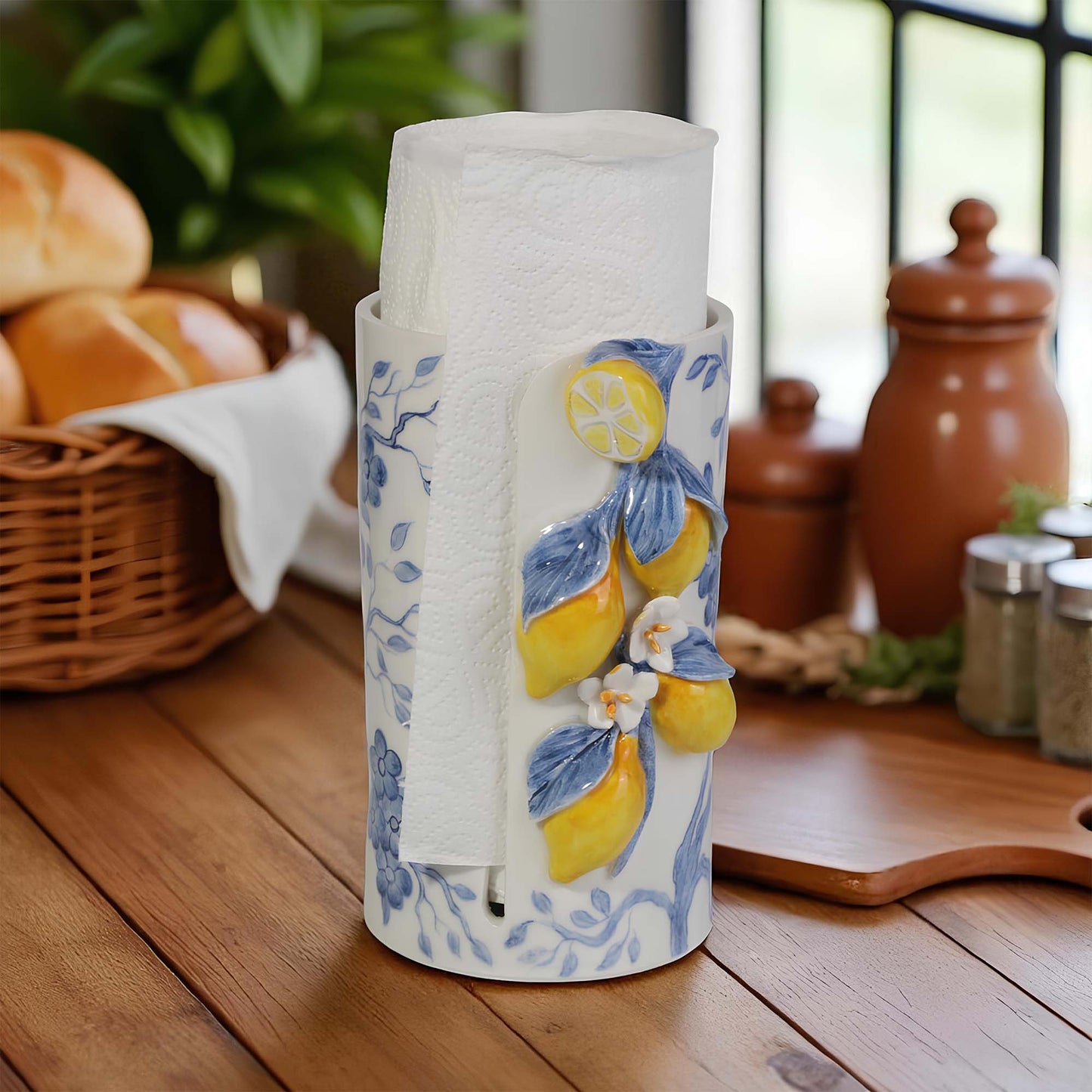 Decorative paper towel holder with lemons on a wooden table