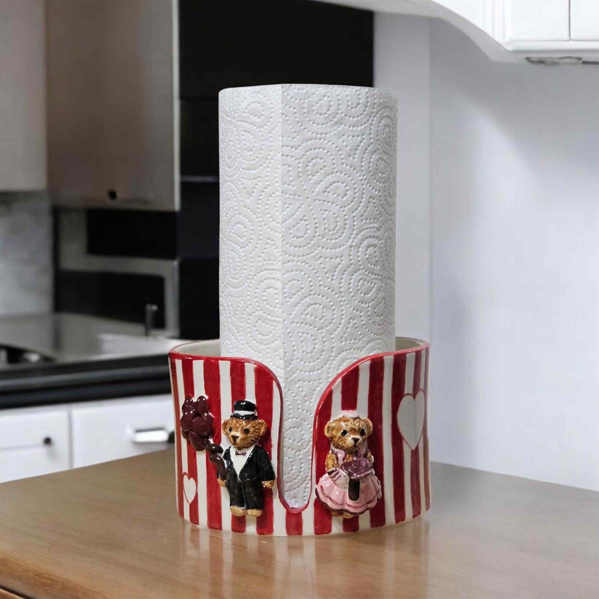 Decorative paper towel holder with teddy bears on a kitchen counter