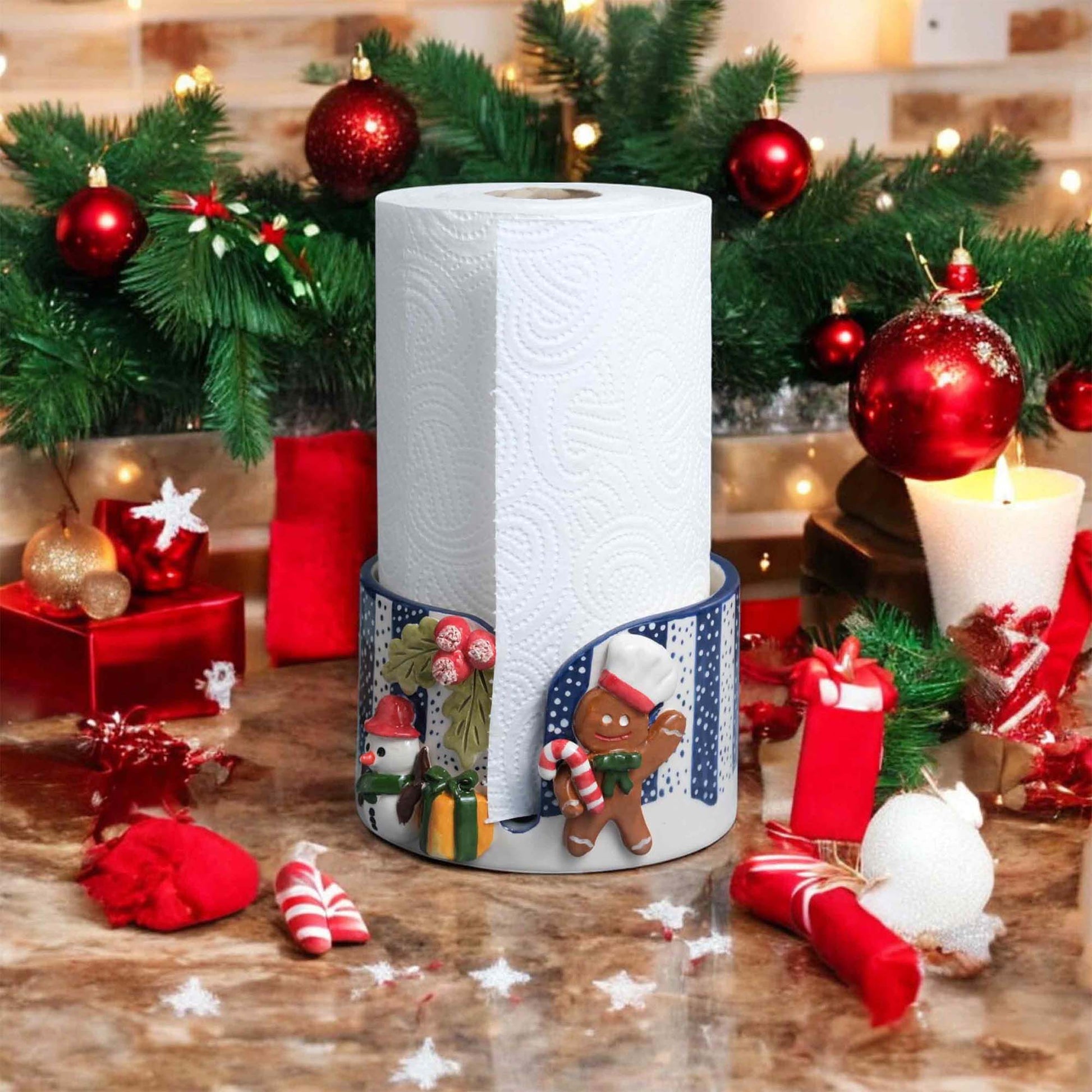 Decorative paper towel holder with Christmas design on a festive background
