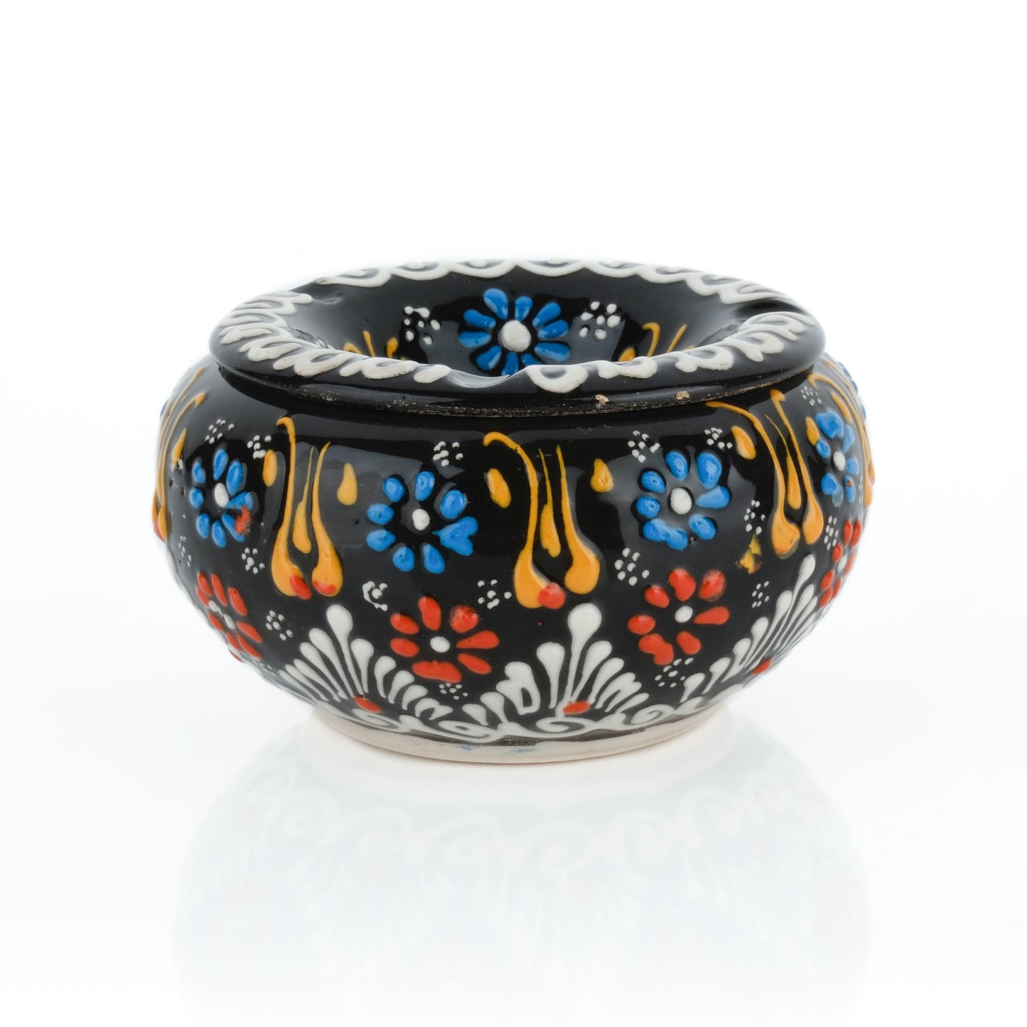 Decorative ceramic ashtray with colorful floral patterns on a white background