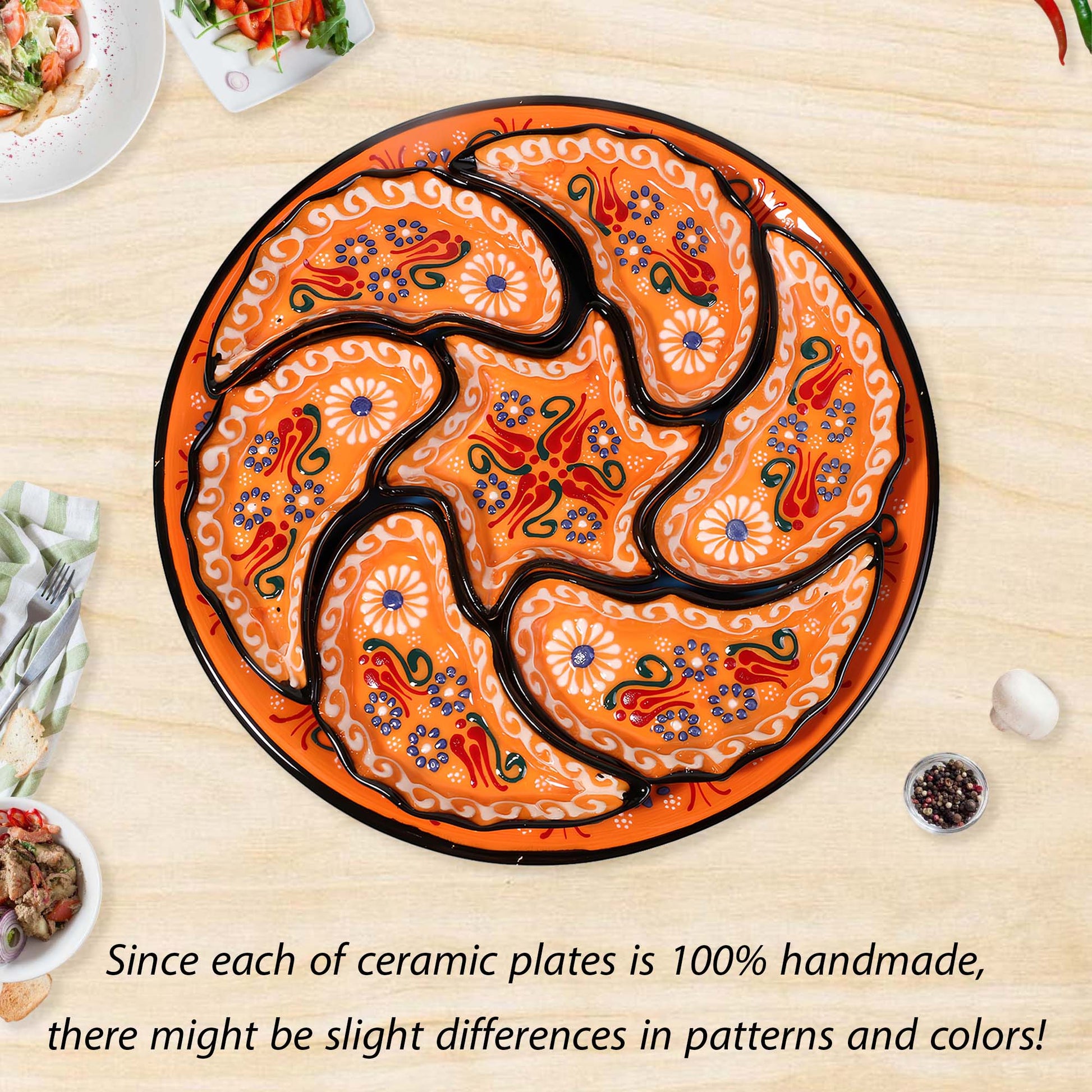 Decorative ceramic snack serving tray setwith intricate designs on a wooden table.