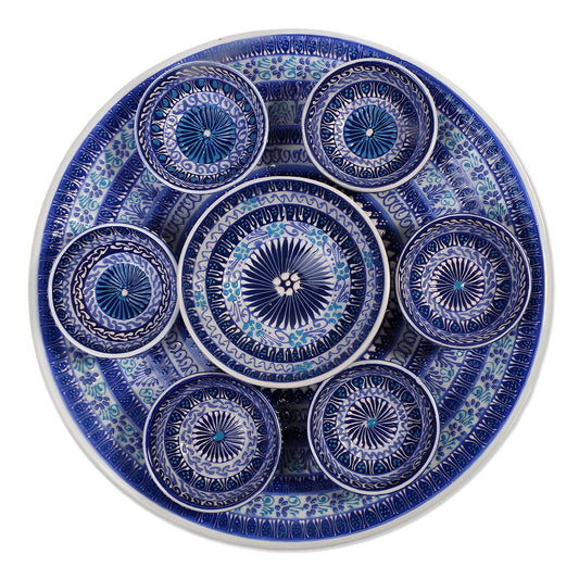 Ceramic snack serving bowls set with blue and white geometric pattern on a white background