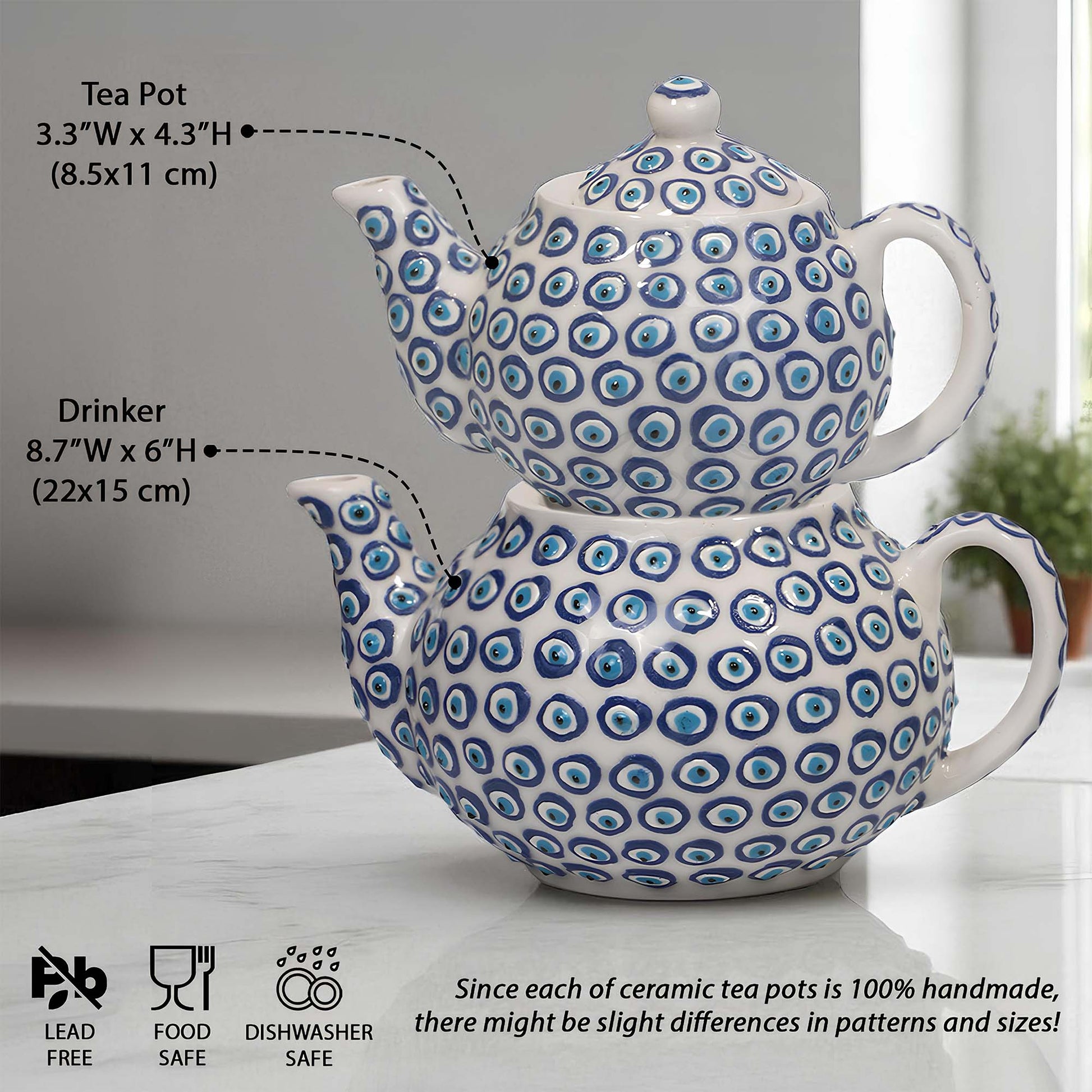 Two ceramic teapots with blue circular patterns on a white surface, with measurements and safety information displayed.