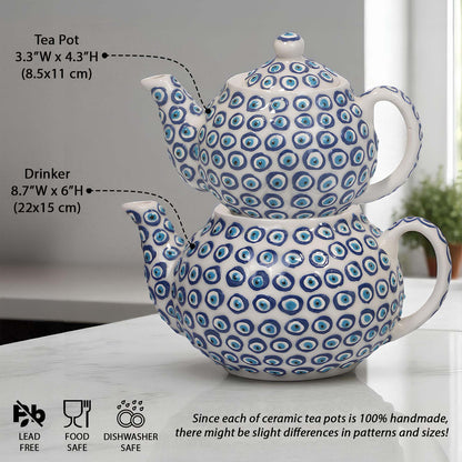 Two ceramic teapots with blue circular patterns on a white surface, with measurements and safety information displayed.