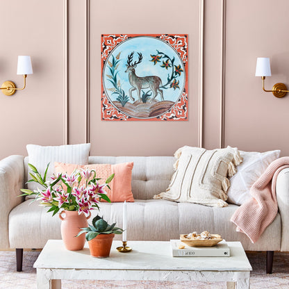 Decorative ceramic tile above a sofa in a living room.