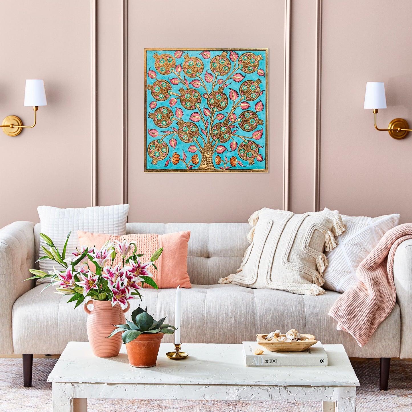 Decorative living room with a colorful ceramic tile and a sofa with pillows.